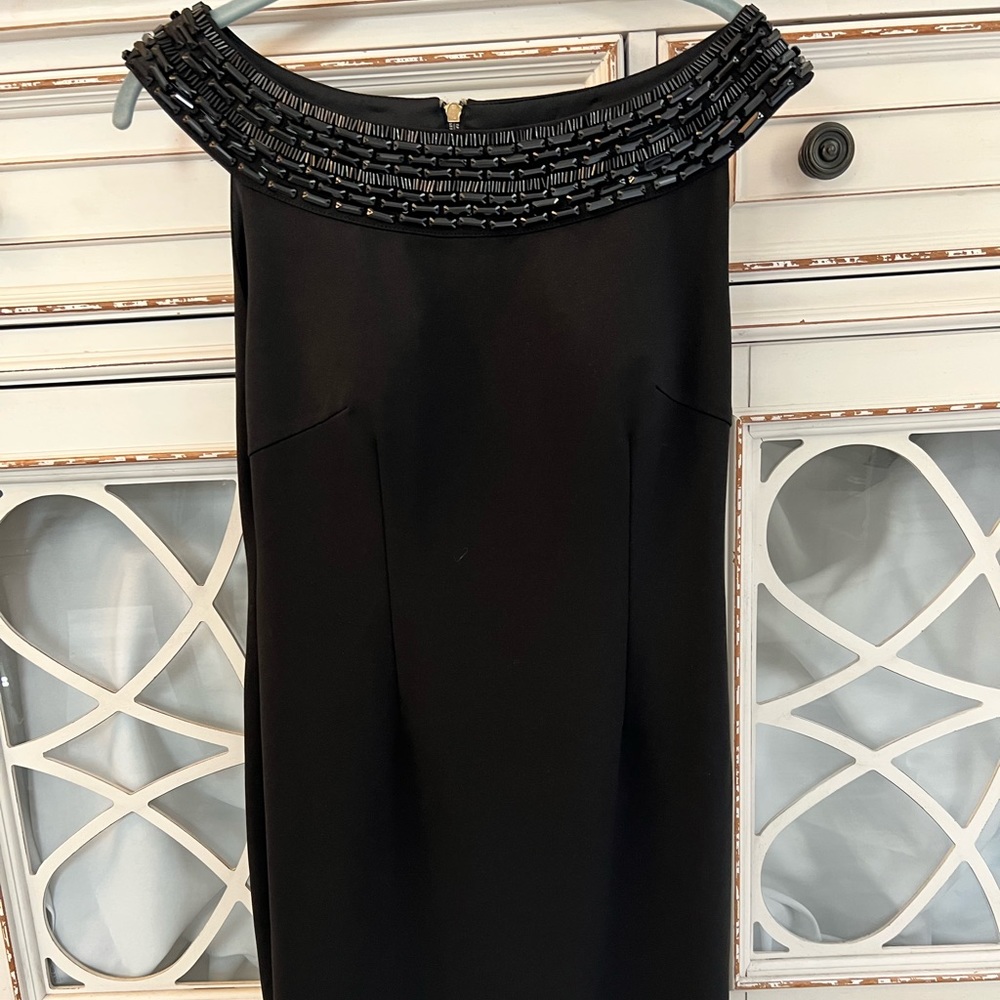 Black dress  above the knee beading up top